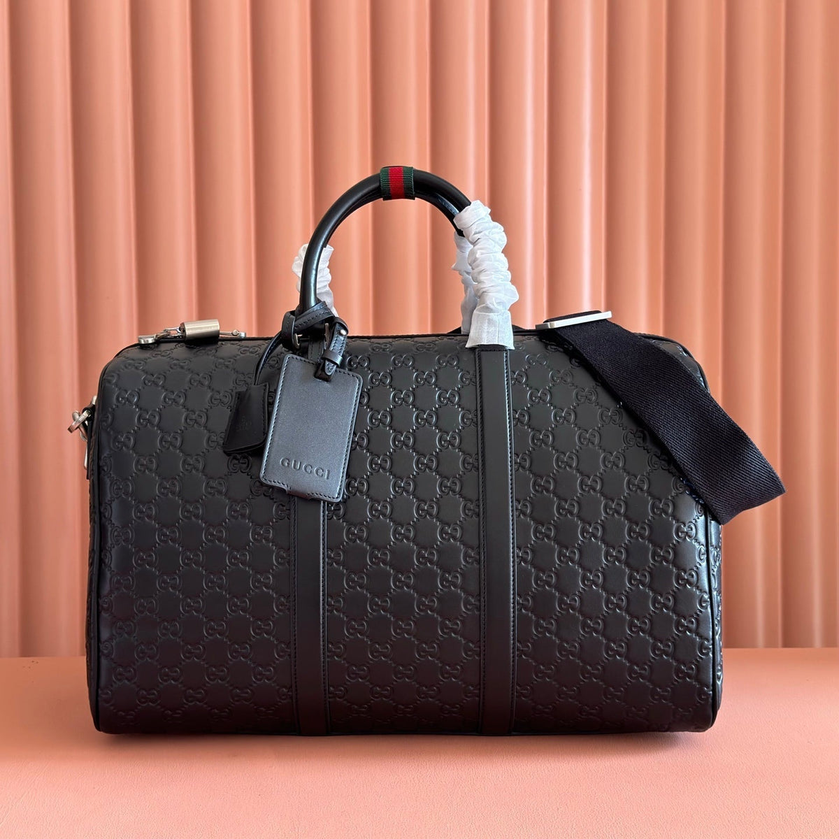 GUCCI 26S EMBLEM DUFFLE BAG 45 IN BLACK EMBOSSED CALFSKIN